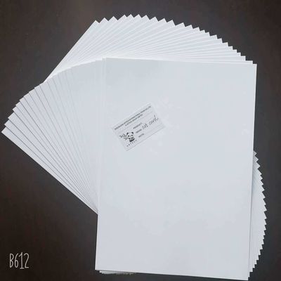 Tipo de pulpación Pulpa química-mecánica doble lado revestido con cartón de arte C2S para impresión